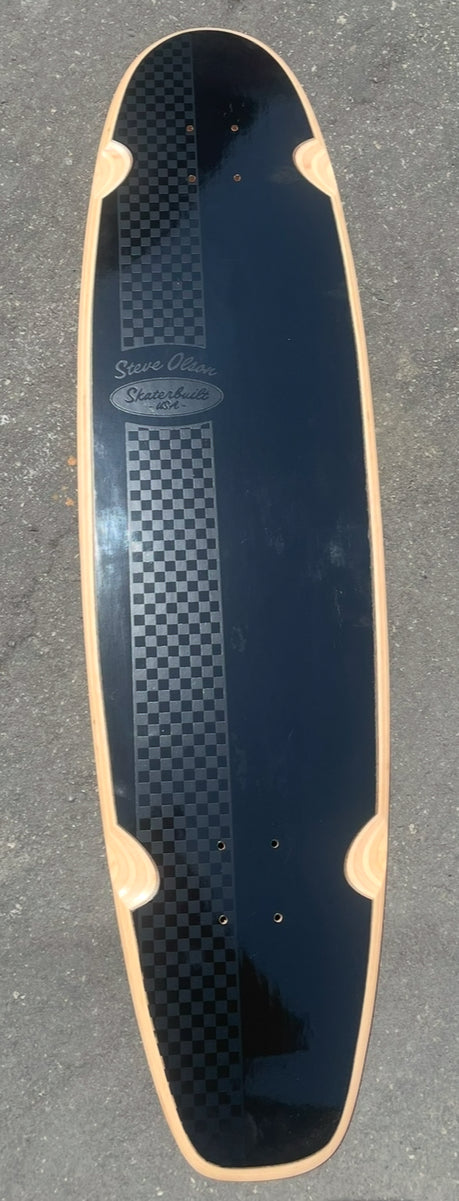Skaterbuilt x Steve Olson Noserider collaboration longboard with gloss black checkered stripe finish